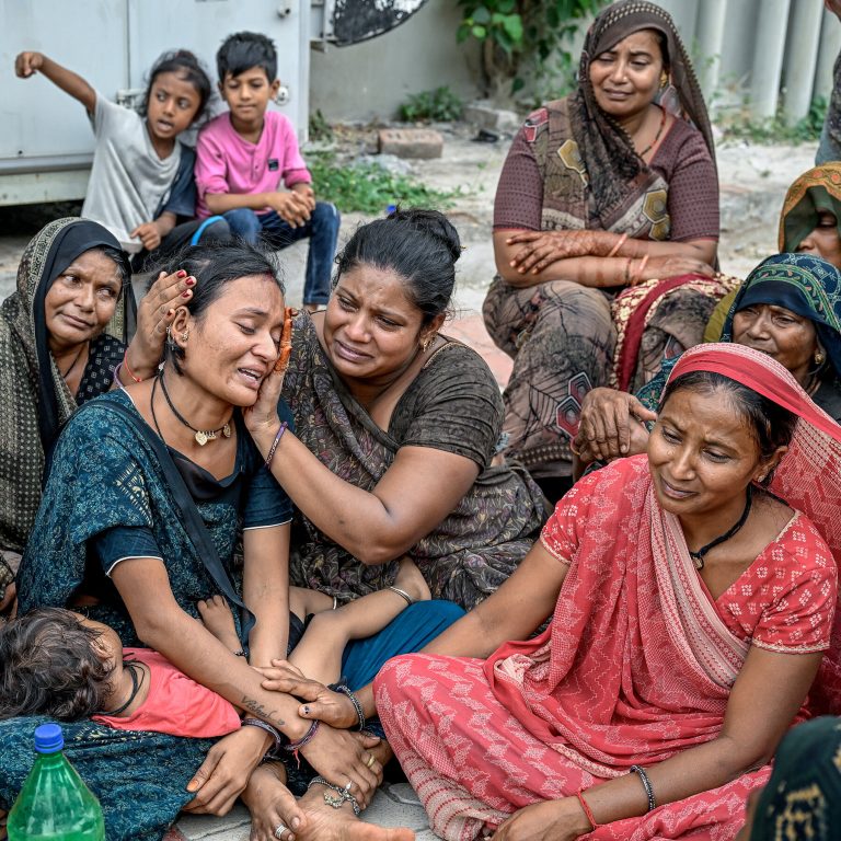 Grieving Relatives of India Air Crash Victims Wait for Bodies to Be Identified